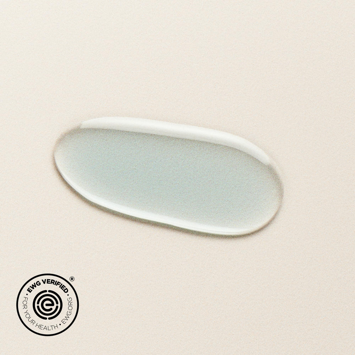DIME blue facial oil applying to blemish area demonstrating targeted spot treatment