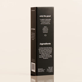 DIME blue facial oil recycled box and bottle detail highlighting sustainable packaging