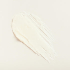 DIME cleansing balm on bathroom counter at night conveying overnight mask hydration