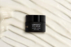 DIME eye serum beside coin showing 15 ml size for practical scale reference