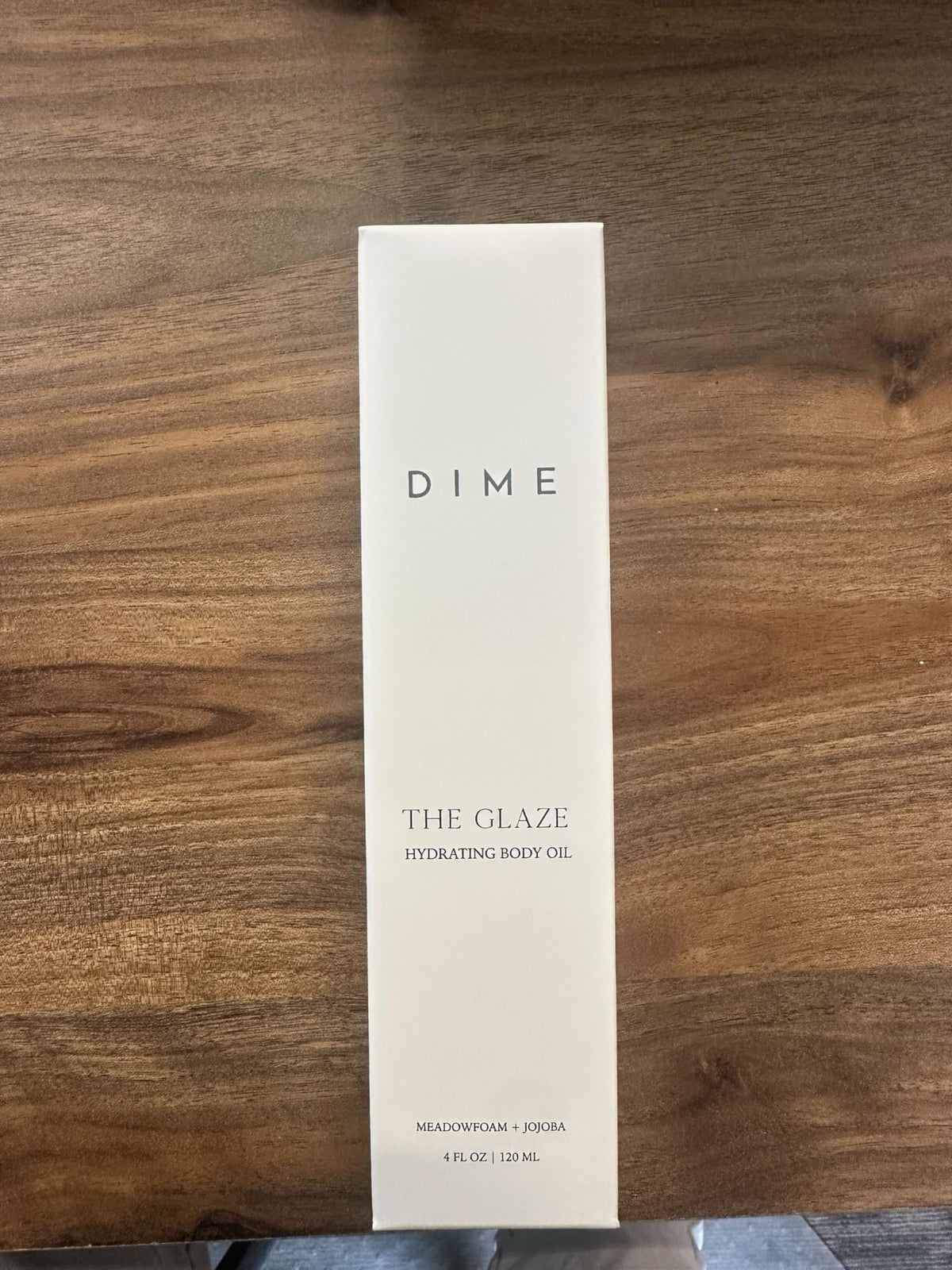 DIME oil surrounded by key botanical ingredients for nutrient-rich benefit