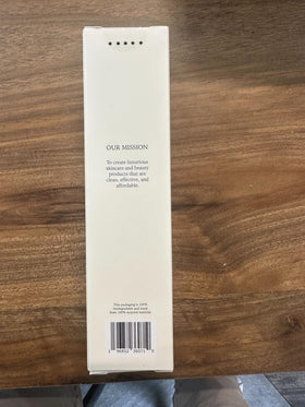 DIME 4 oz bottle next to common items to show compact travel-friendly size