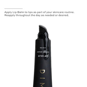 DIME balm placed next to tinted lip balm to show complementary pairing