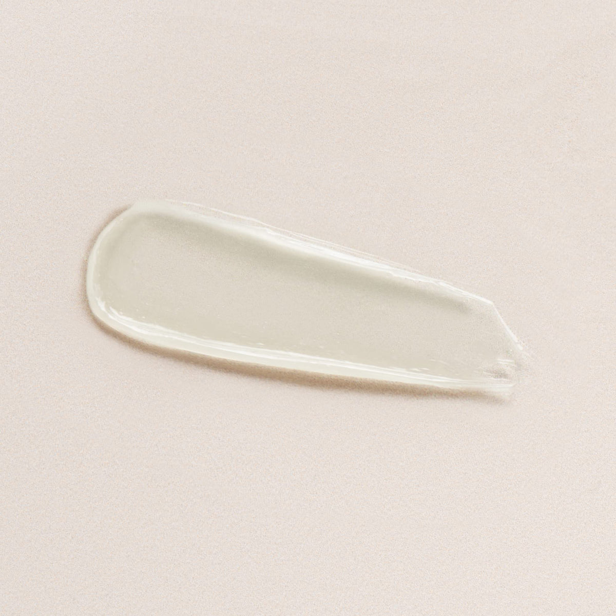 DIME close-up of balm texture on fingertip highlighting smooth hydration