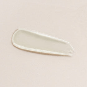 DIME close-up of balm texture on fingertip highlighting smooth hydration