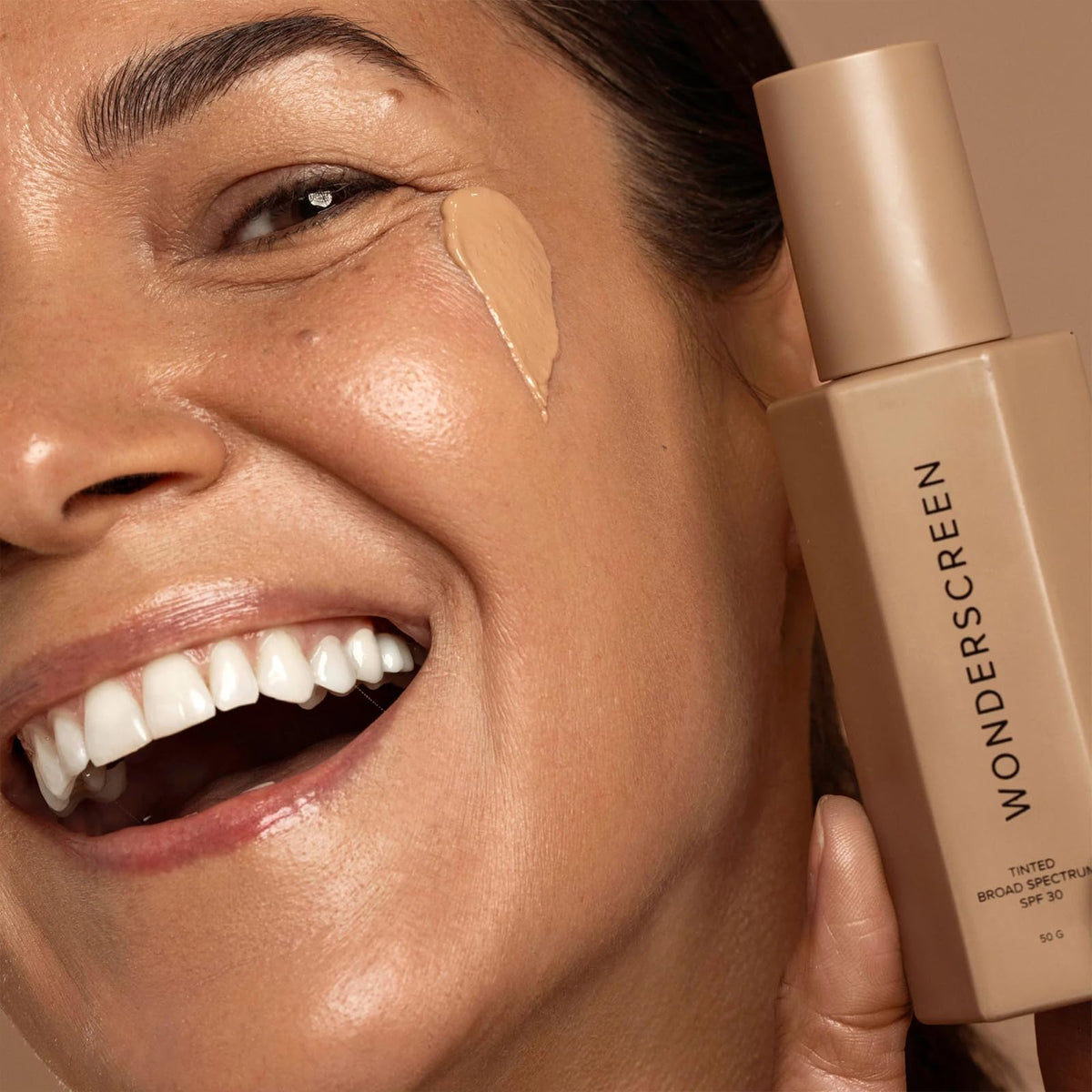 DIME tinted sunscreen under makeup for natural base benefit