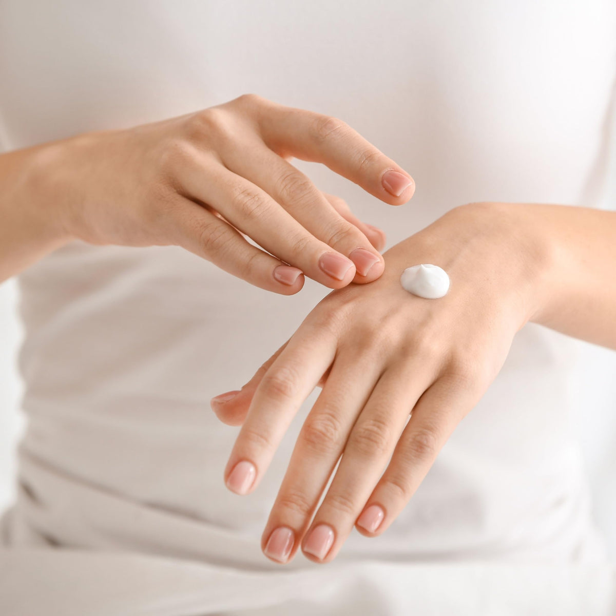 dionis lotion texture swatch on skin showing creamy, fast-absorbing finish
