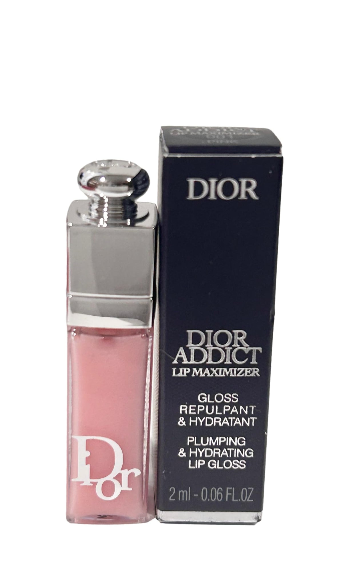 Dior Addict mini placed in a purse illustrating travel convenience and quick touch-ups
