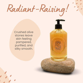 Diptyque close-up of olive stone particles showing gentle exfoliating action
