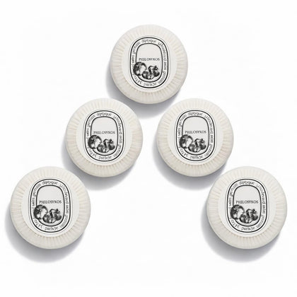 Diptyque Philosykos pleat-wrapped five-bar set presented neatly for elegant gifting