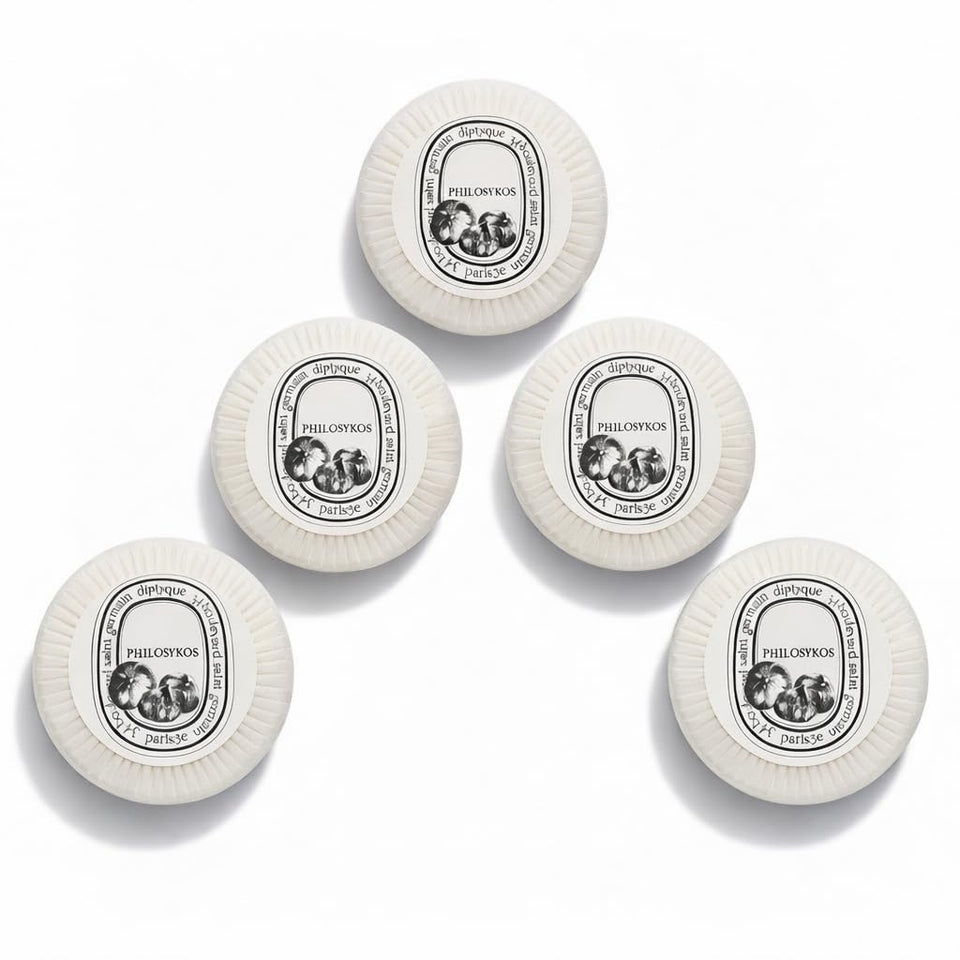 Diptyque Philosykos pleat-wrapped five-bar set presented neatly for elegant gifting