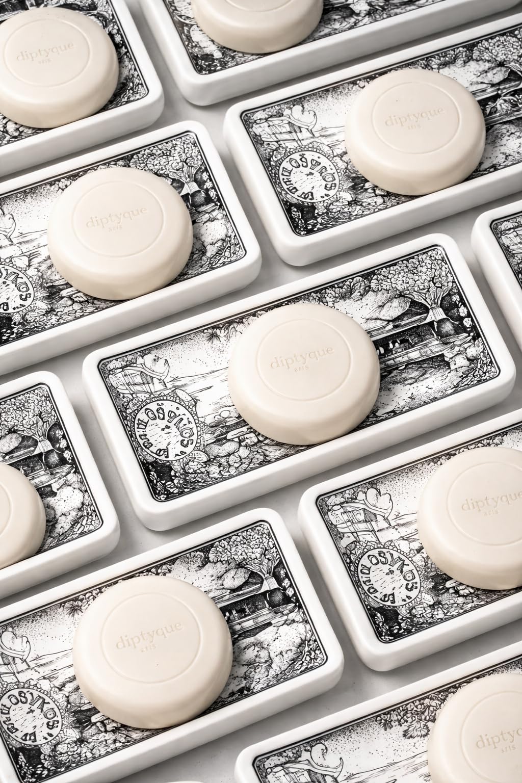 Diptyque Philosykos soaps styled on guest bathroom tray for a luxury welcome