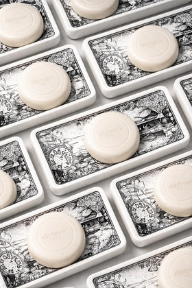 Diptyque Philosykos soaps styled on guest bathroom tray for a luxury welcome