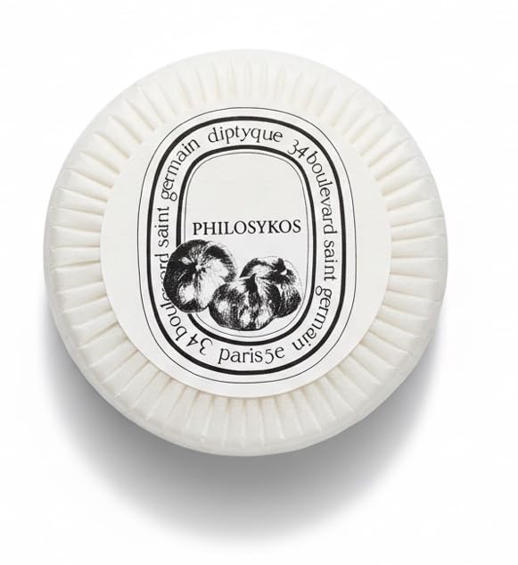 Diptyque Philosykos stamped round soap close-up showing brand seal and craftsmanship