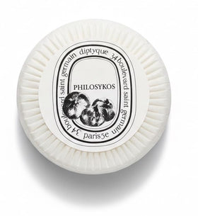 Diptyque Philosykos stamped round soap close-up showing brand seal and craftsmanship