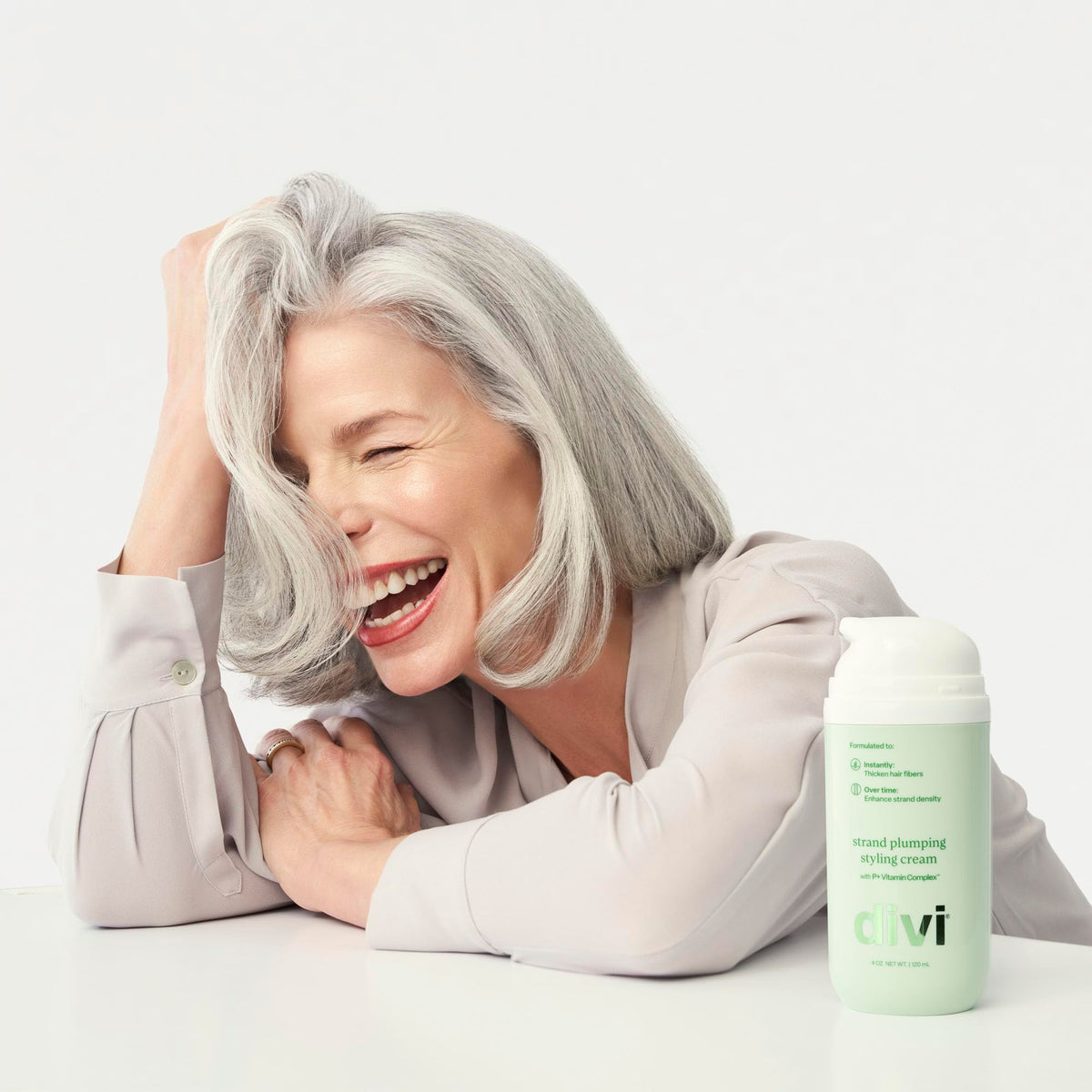 divi cream size shown with hand for scale and travel-friendly benefit
