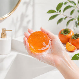 DLWUEN persimmon soap in bathroom lifestyle scene promoting confidence and freshness
