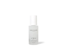Dolce Glow self-tanning mist nozzle close-up showing fine spray for streak-free color