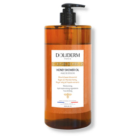 Doliderm bottle front view showing elegant honey shower oil and vitamin-rich formula benefit