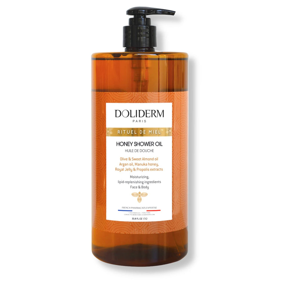 Doliderm bottle front view showing elegant honey shower oil and vitamin-rich formula benefit
