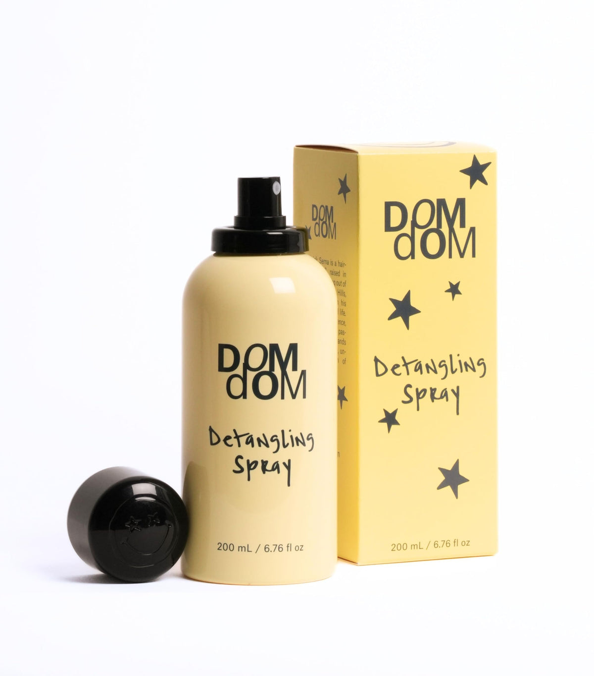 Dom Dom fine mist spray close-up showing texture and easy application benefit