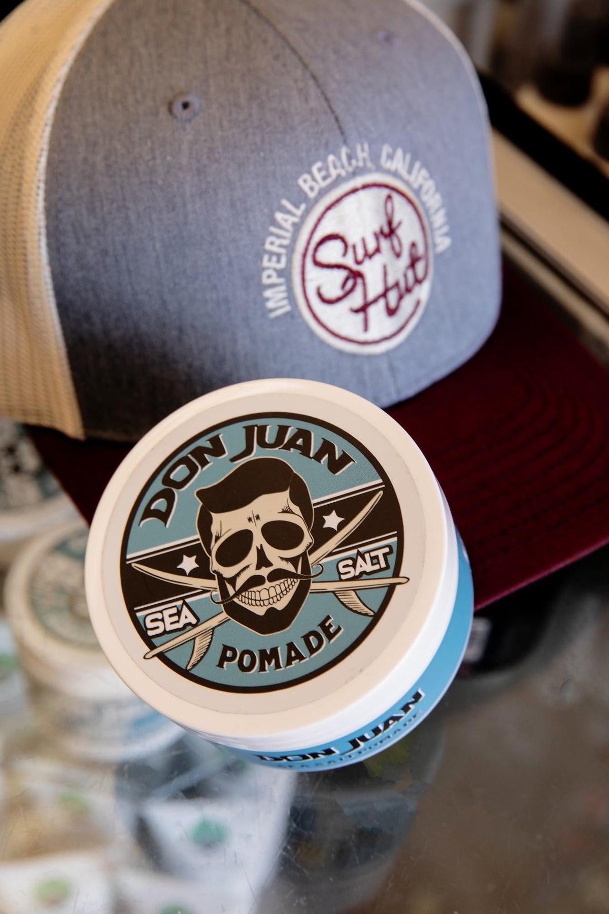 Don Juan pomade tucked into a toiletry bag for on-the-go grooming