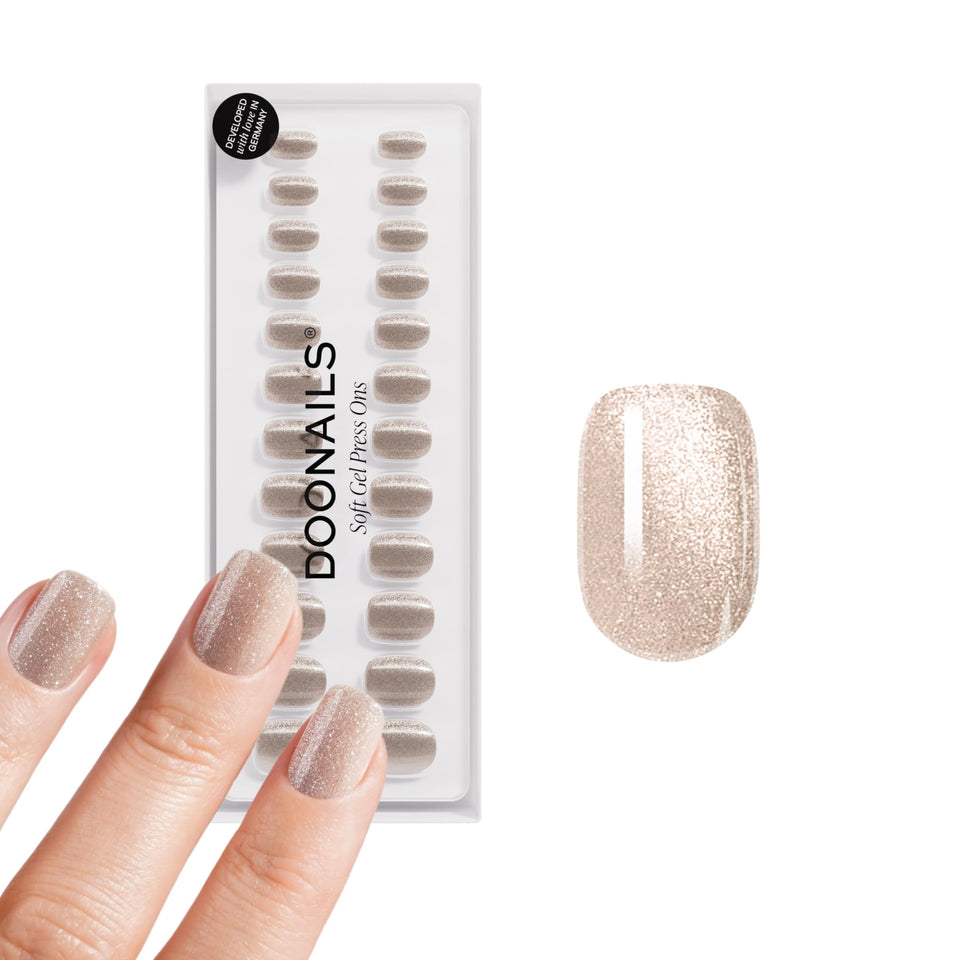 DOONAILS front packaging showing champagne metallic finish and kit contents for easy application