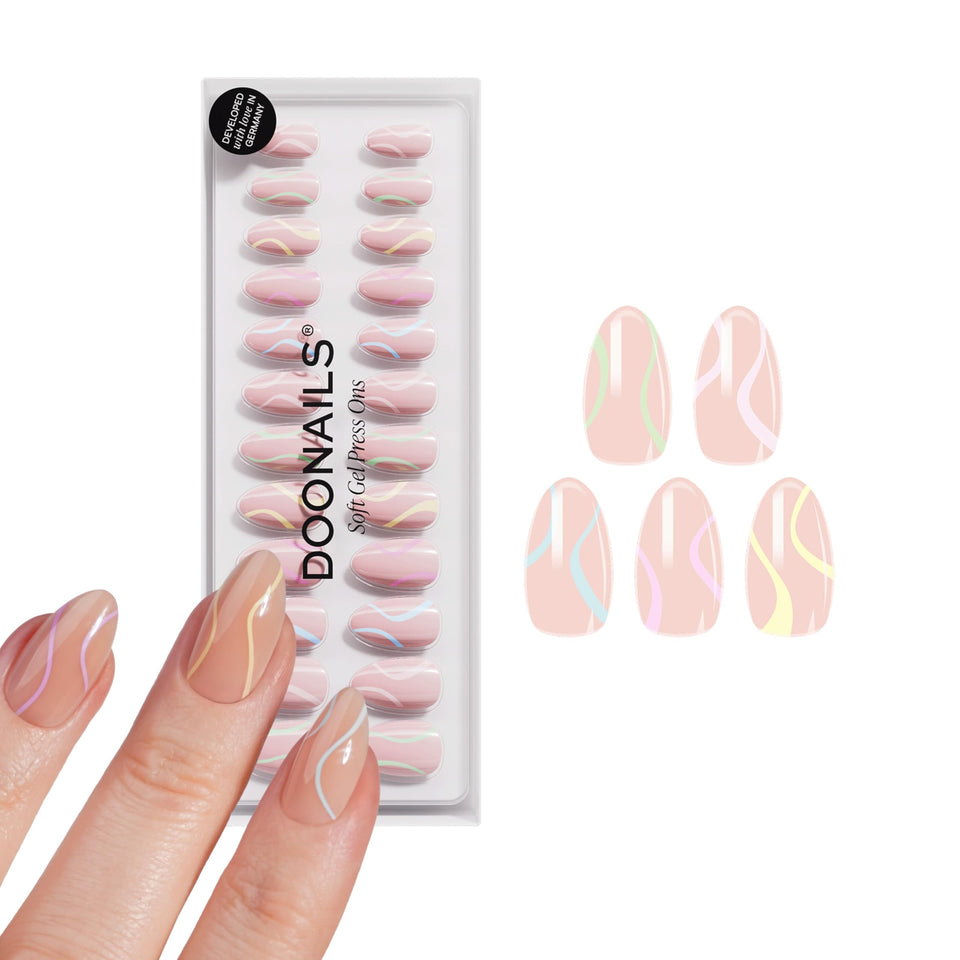 DOONAILS front packaging showing pastel almond set and included tools for easy styling