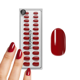 DOONAILS front packaging showing red medium round nails and kit benefits