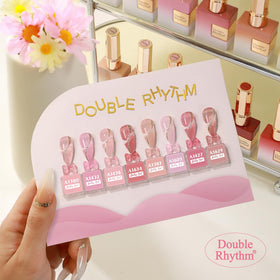 Double Rhythm bottles warming in water to improve flow before use