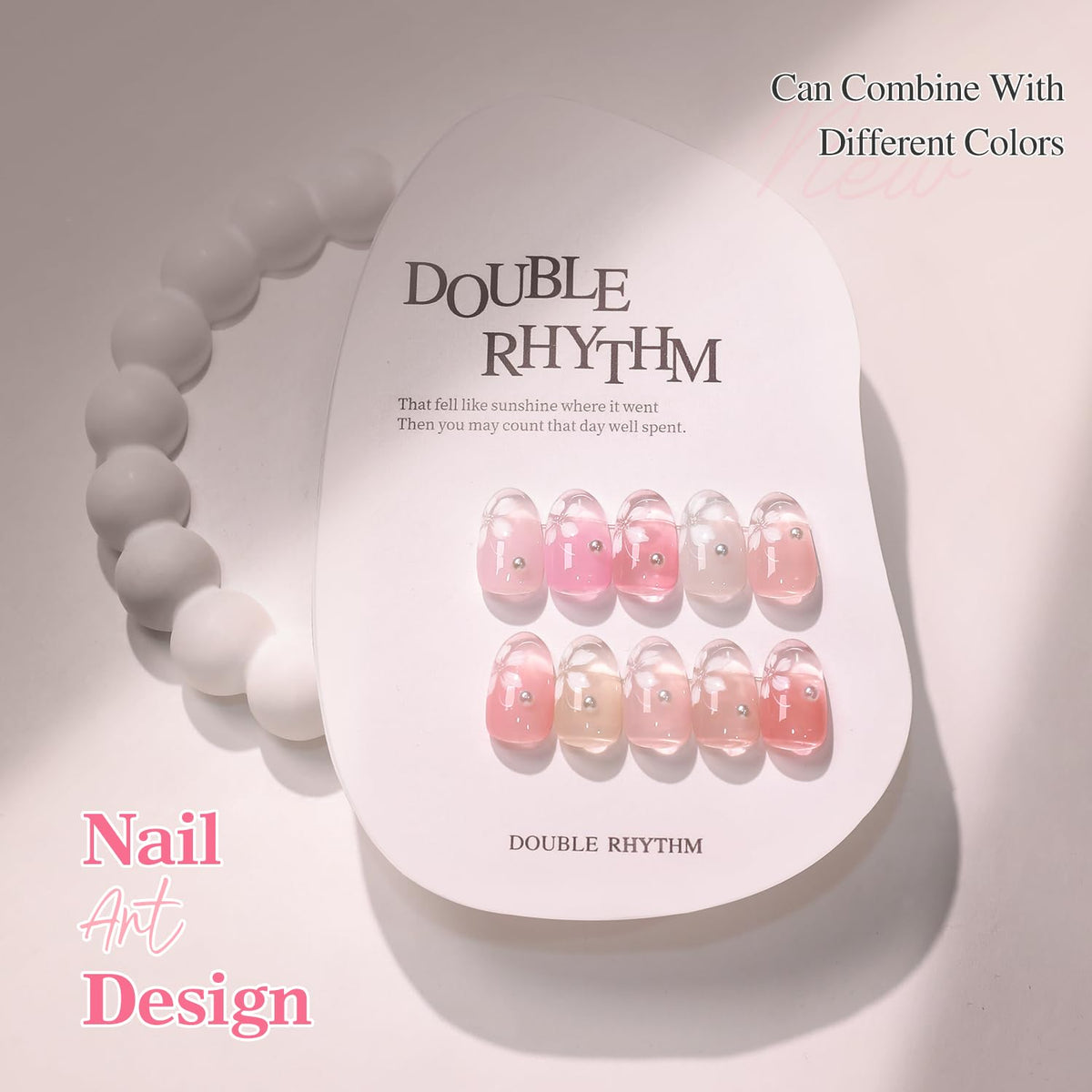 Double Rhythm finished manicure on nails showcasing glossy jelly finish