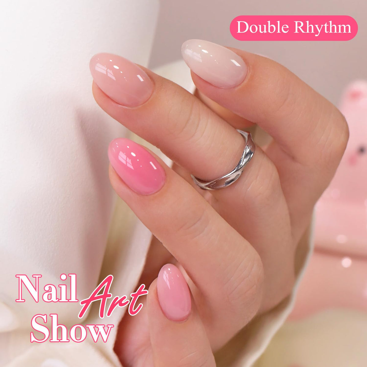 Double Rhythm styled hands in lifestyle setting showcasing natural soft-pink nails