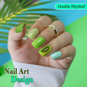 Double Rhythm finished manicure on nails showcasing salon-quality gloss