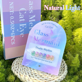 Double Rhythm cured nails under light showing high-gloss topcoat durability benefit