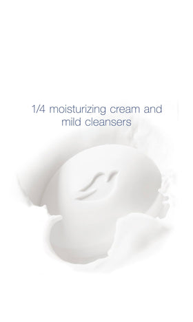 Dove bar close-up showing creamy lather and gentle texture for soft skin