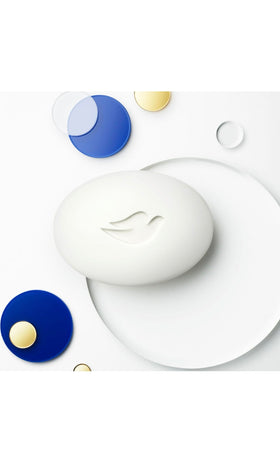 Dove bar in use on wet hands demonstrating gentle cleansing and hydration