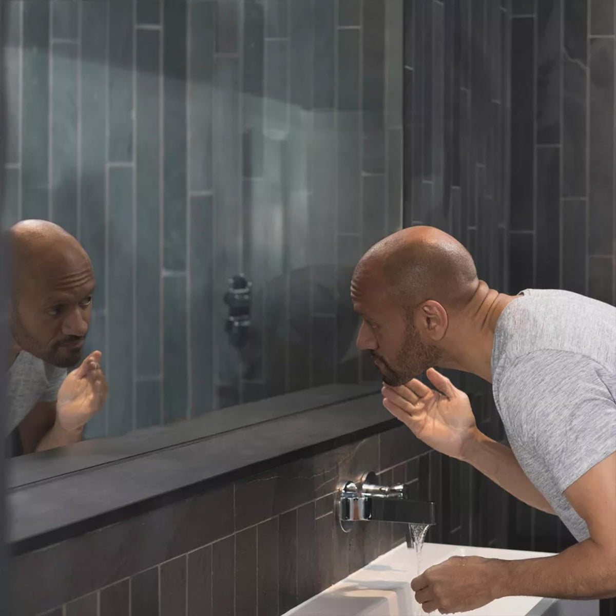 Dove Men+Care bundle in a bathroom setting illustrating easy travel-ready skincare routine