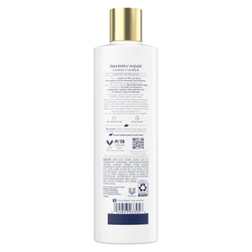 Dove bottle label close-up highlighting Keratin Repair Actives benefit