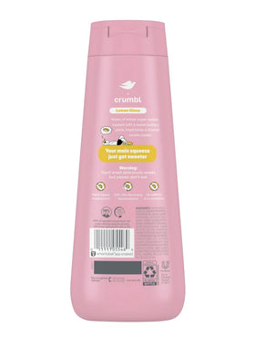 Dove x Crumbl bottle in shower scene dispensing lather, leaves skin soft benefit