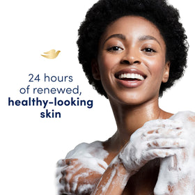 Dove body wash in a shower setting adding a comforting sensory atmosphere