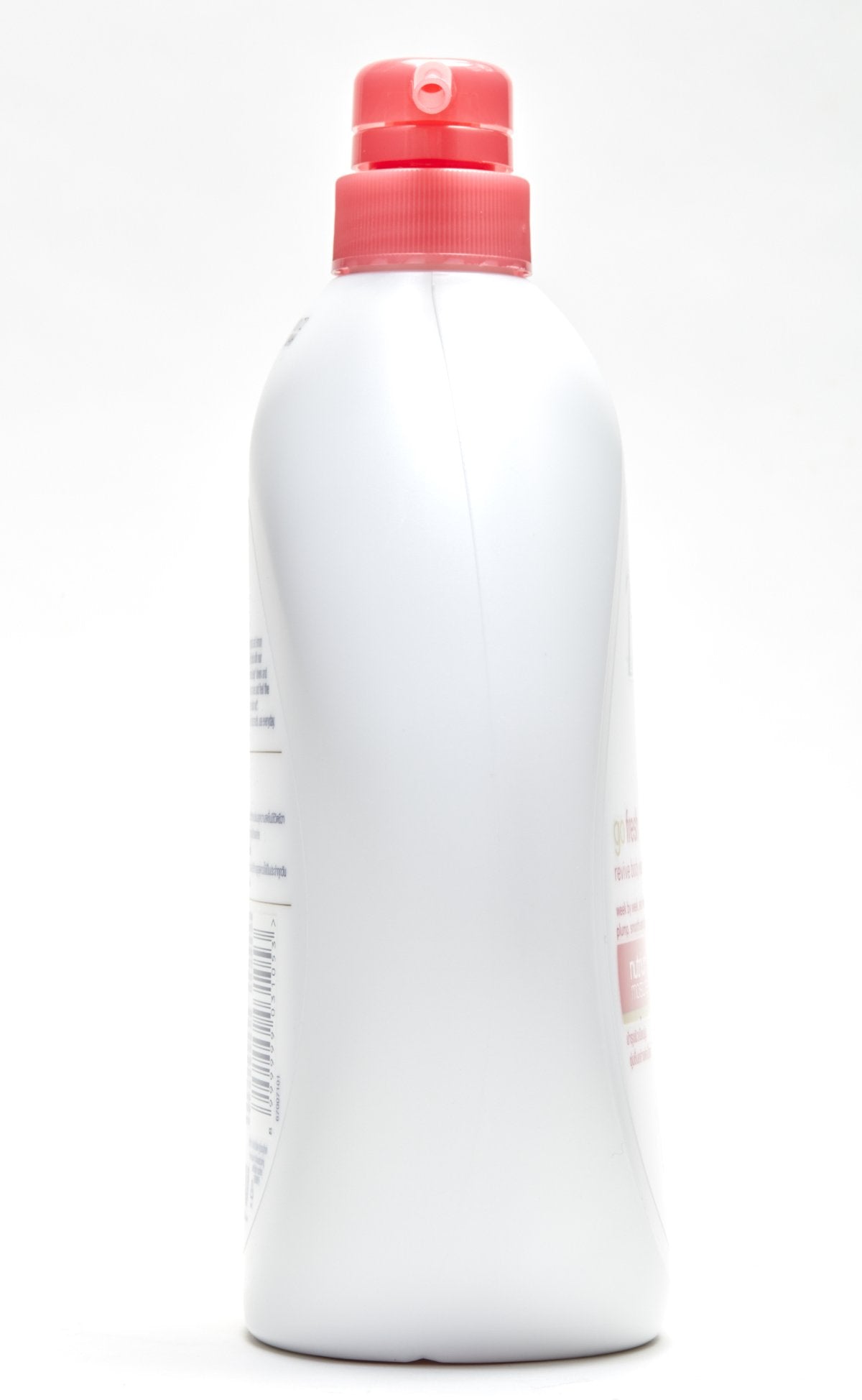 Dove bottle in shower lifestyle scene showing invigorating use and fresh fragrance benefit
