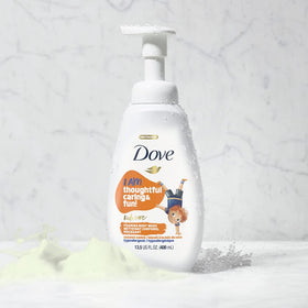 Dove kids bottle held in hands showing size and easy-pump benefit