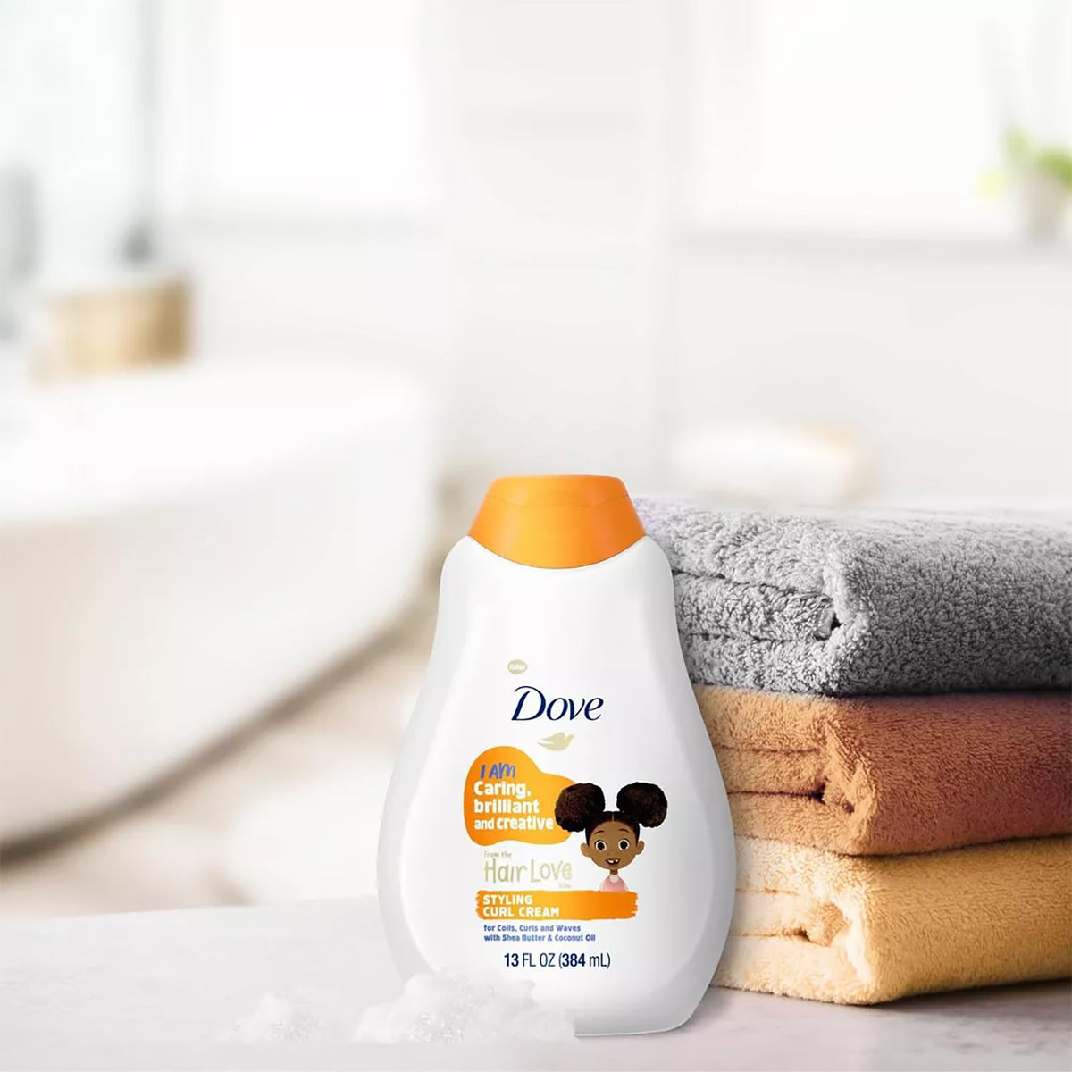 Dove styling cream tube top view showing scoopable texture for definition