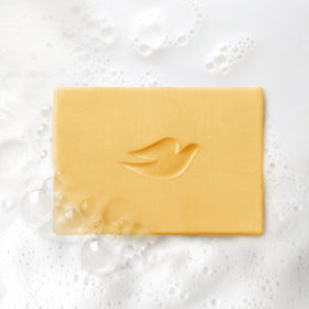Dove ingredient label closeup showing no sulfates or parabens for safer cleansing