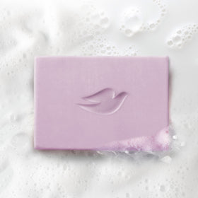 Dove bar on bathroom shelf styled for a calming shower ritual benefit