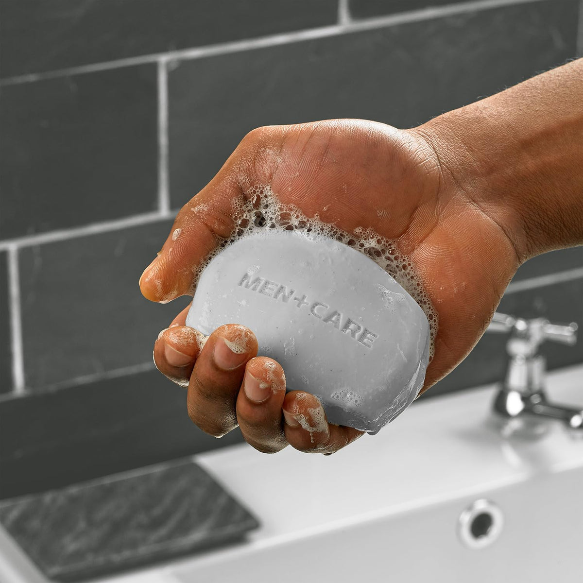 Dove Men+Care bar beside razor illustrating use as shave aid for close shave