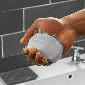 Dove Men+Care boxes opened to show multiple bars for long-lasting supply benefit