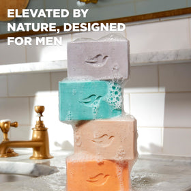 DOVE MEN + CARE foamy lather in hand demonstrating gentle cleansing benefit