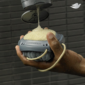 DOVE MEN + CARE shower tool in modern bathroom to show everyday use