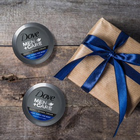 Stacked Dove Men+Care jars showing bulk pack value for frequent use